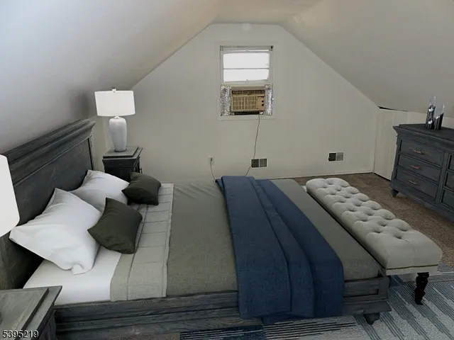 a view of a house with backyard and garden