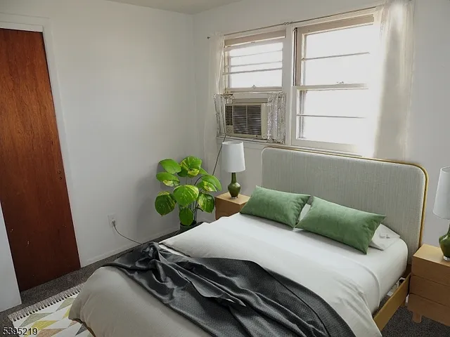 a view of a house with wooden deck