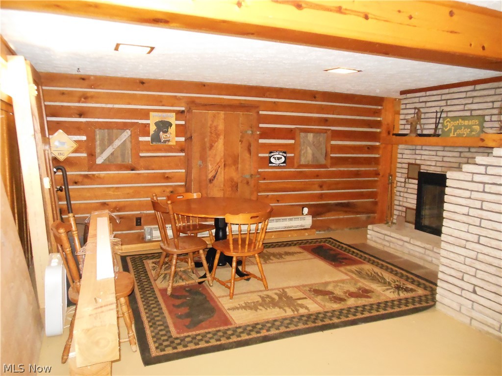 10085 Franchester Road Burbank, OH 44214 - Photo 30 of 40 Rec room with fireplace