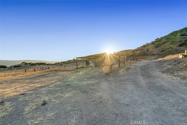 a view of chairs and table in the ocean