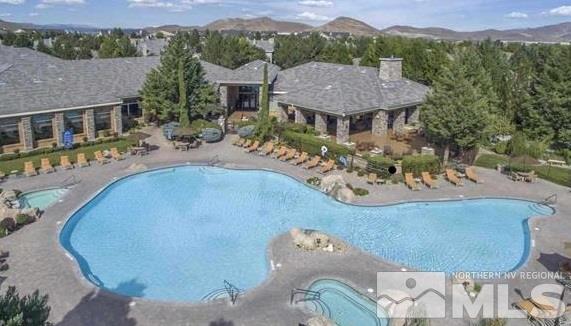 900 S Meadows, Unit 2923 Reno, NV 89521 - Photo 1 of 1 an aerial view of a house with yard and patio