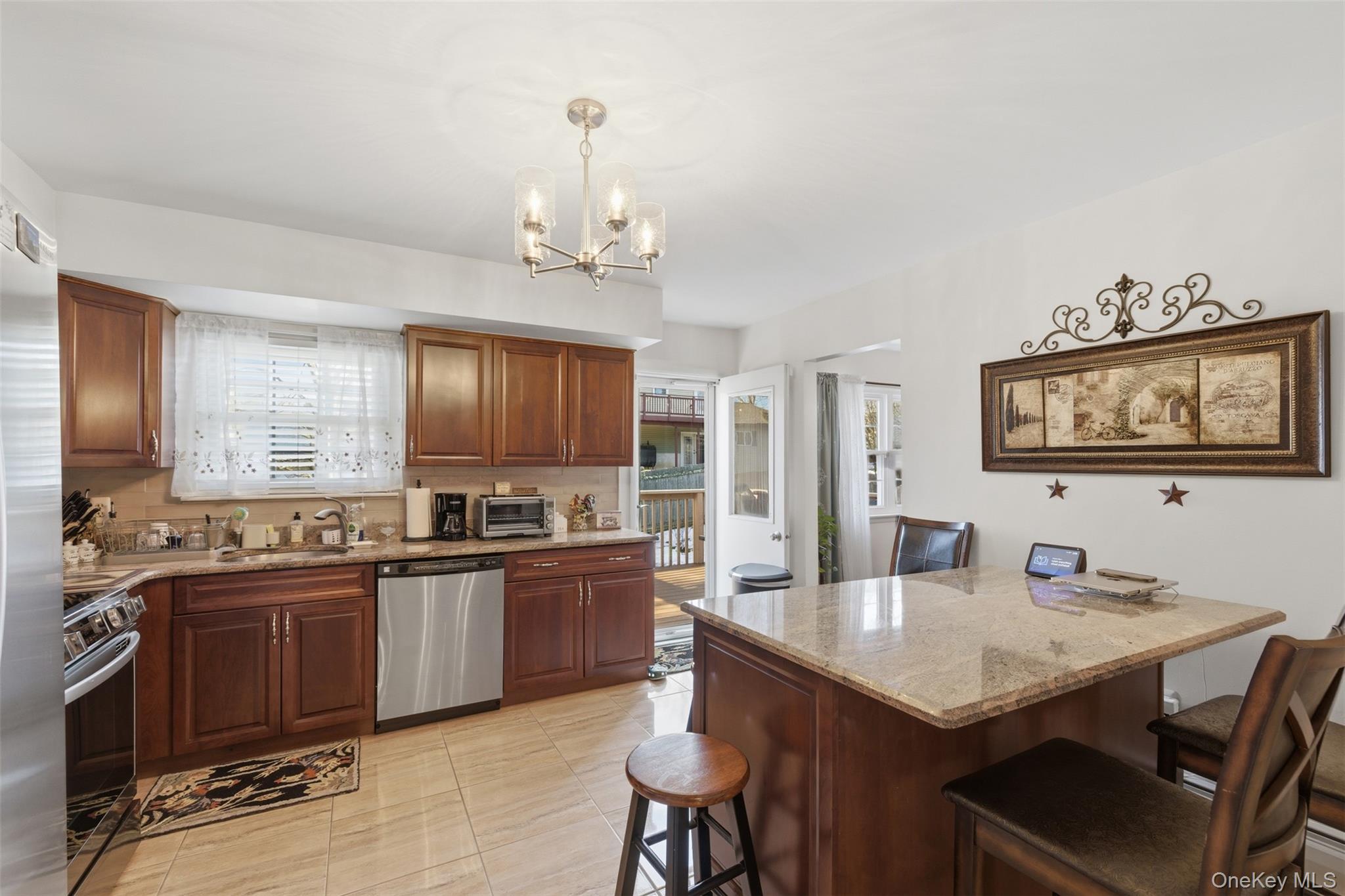 1 Weather Vane Way Middletown, NY 10940 - Photo 14 of 41 a kitchen with granite countertop a sink and cabinets