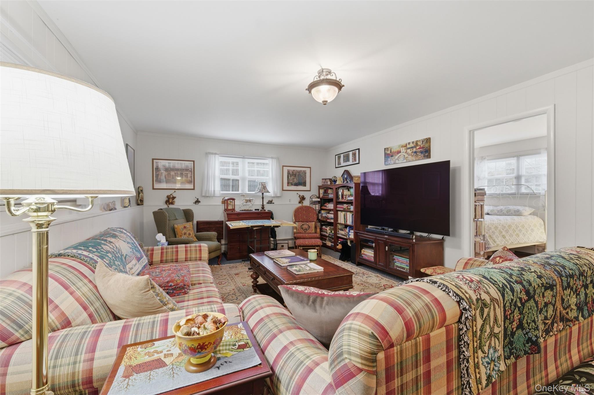 1 Weather Vane Way Middletown, NY 10940 - Photo 22 of 41 a living room with furniture and a flat screen tv