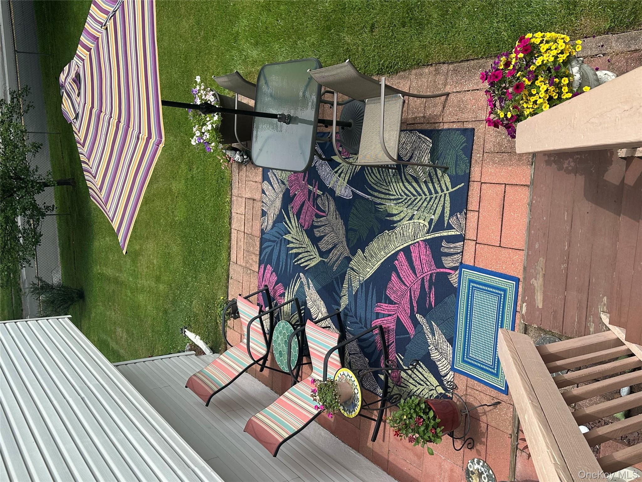 1 Weather Vane Way Middletown, NY 10940 - Photo 36 of 41 a view of a patio with table and chairs potted plants