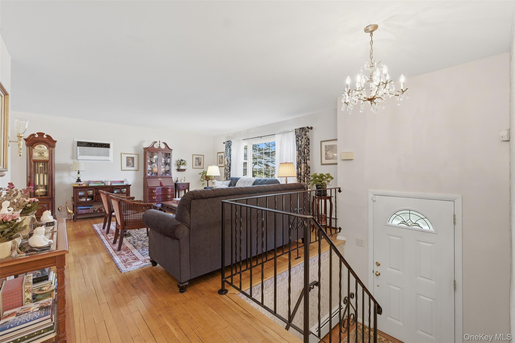 1 Weather Vane Way Middletown, NY 10940 - Photo 6 of 41 a living room with furniture a chandelier and wooden floor