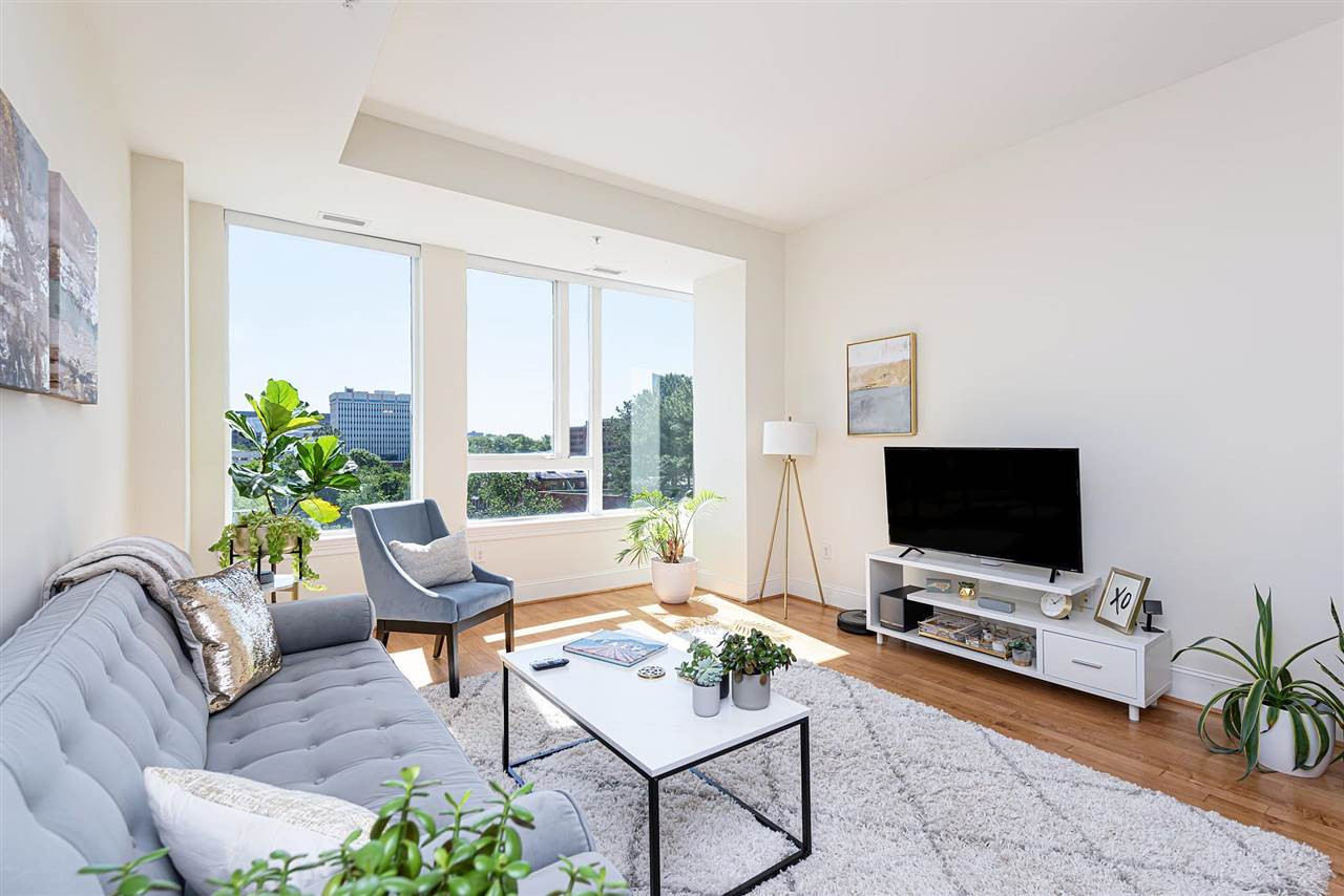 400 West North Street, Unit 628 Raleigh, NC 27603 - Photo 2 of 29 10 foot ceilings and a wall of glass!