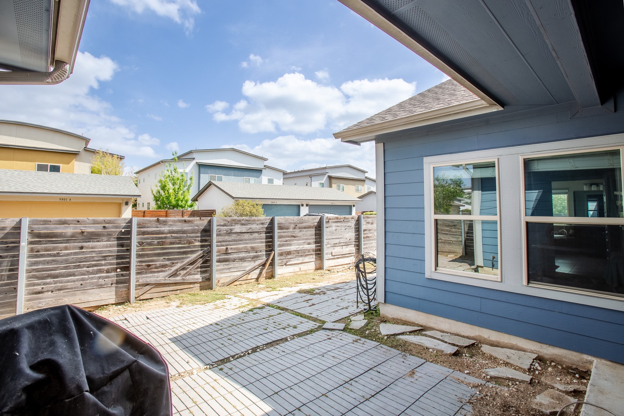 8709 Slater Drive Austin, TX 78747 - Photo 32 of 36 a view of a patio with a table and chairs