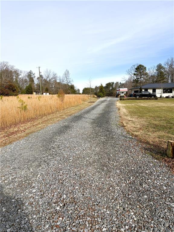 5538 Murphy Road Summerfield, NC 27358 - Photo 17 of 18 View from Murphy Rd, looking at the easement that runs into the lot