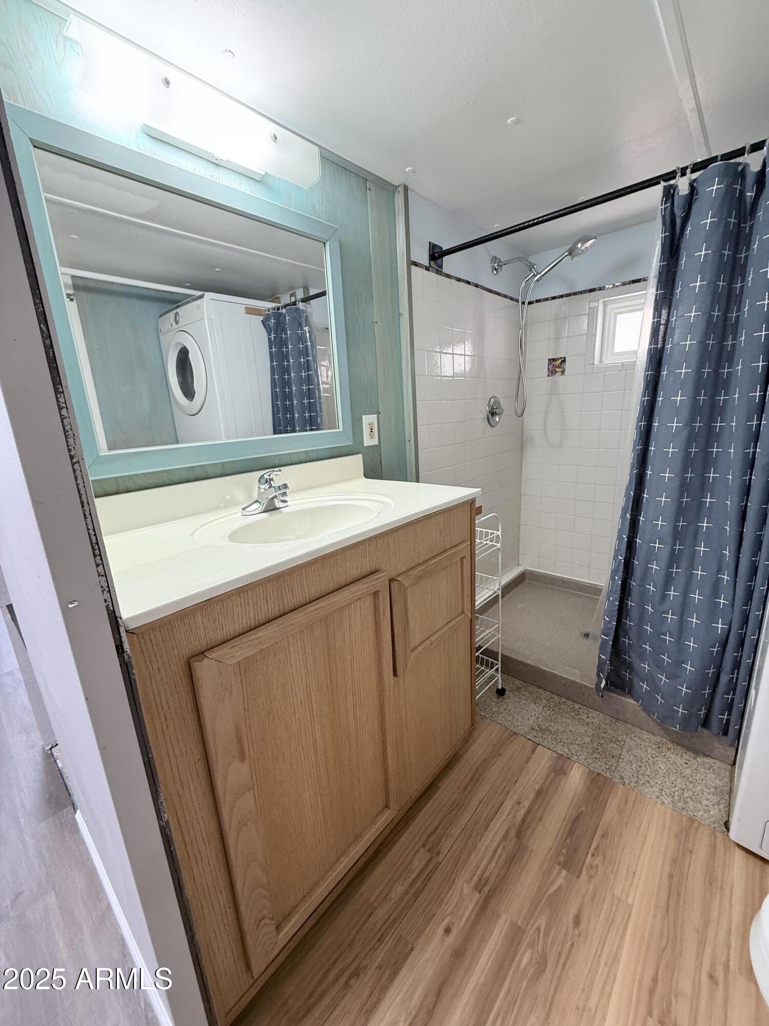960 Peace Lane, Unit 77 Prescott, AZ 86305 - Photo 13 of 27 a utility room with dryer and washer