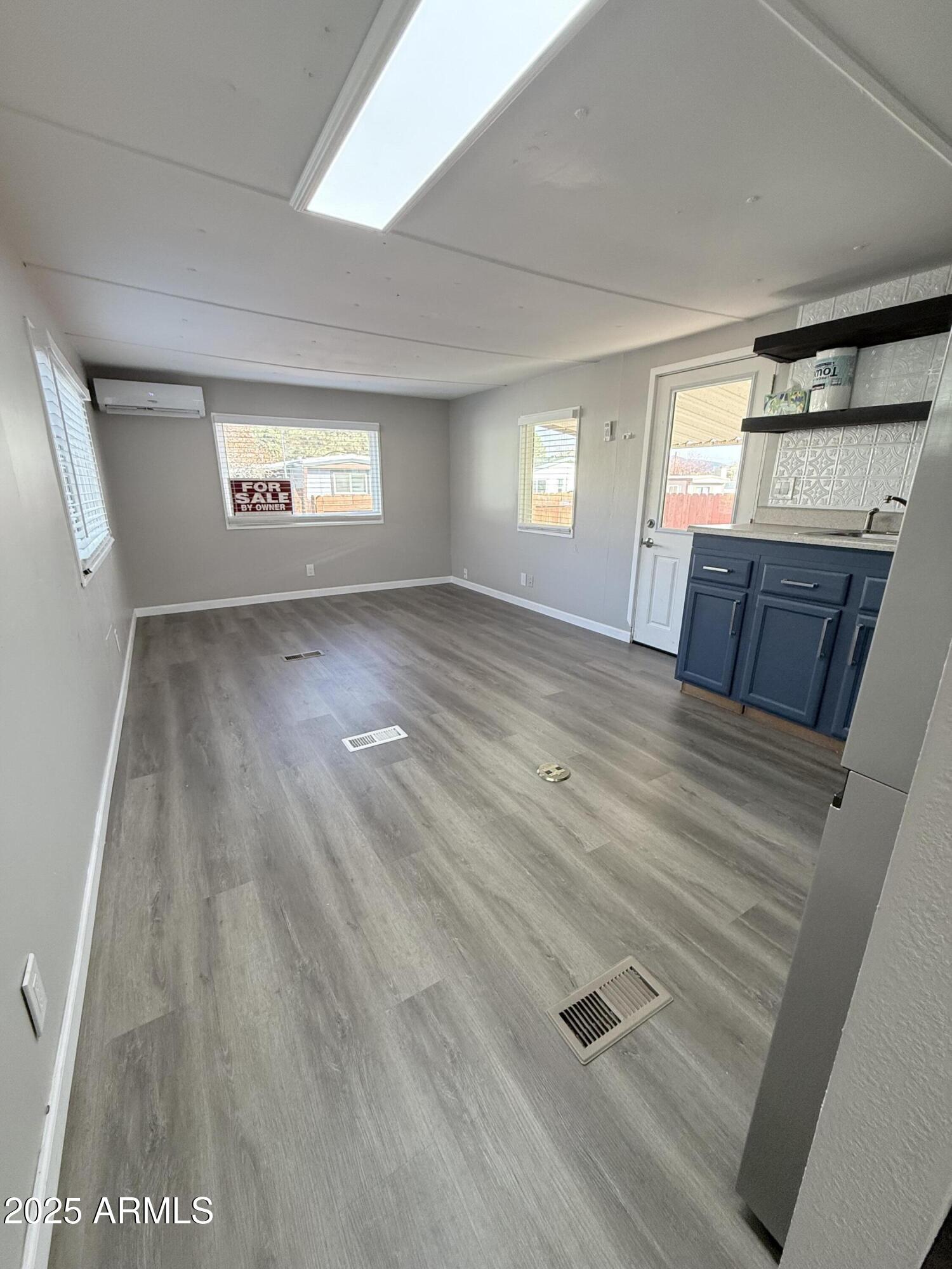 960 Peace Lane, Unit 77 Prescott, AZ 86305 - Photo 21 of 27 a view of an empty room with a window