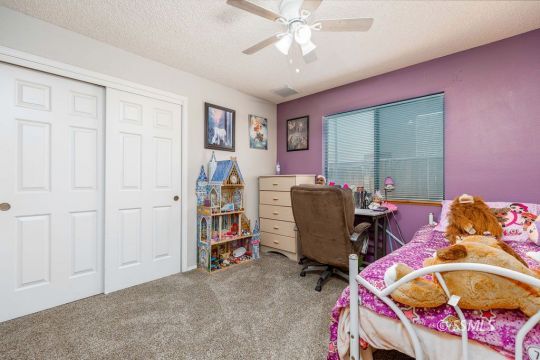 1004 Conejo Avenue Ridgecrest, CA 93555 - Photo 21 of 33 a view of a livingroom with workspace and a window