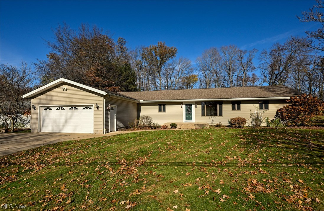 1509 McTaggart Road Stow, OH 44224 - Photo 1 of 30 Well maintained Ranch, with a 2 car garage and a oversized front lawn