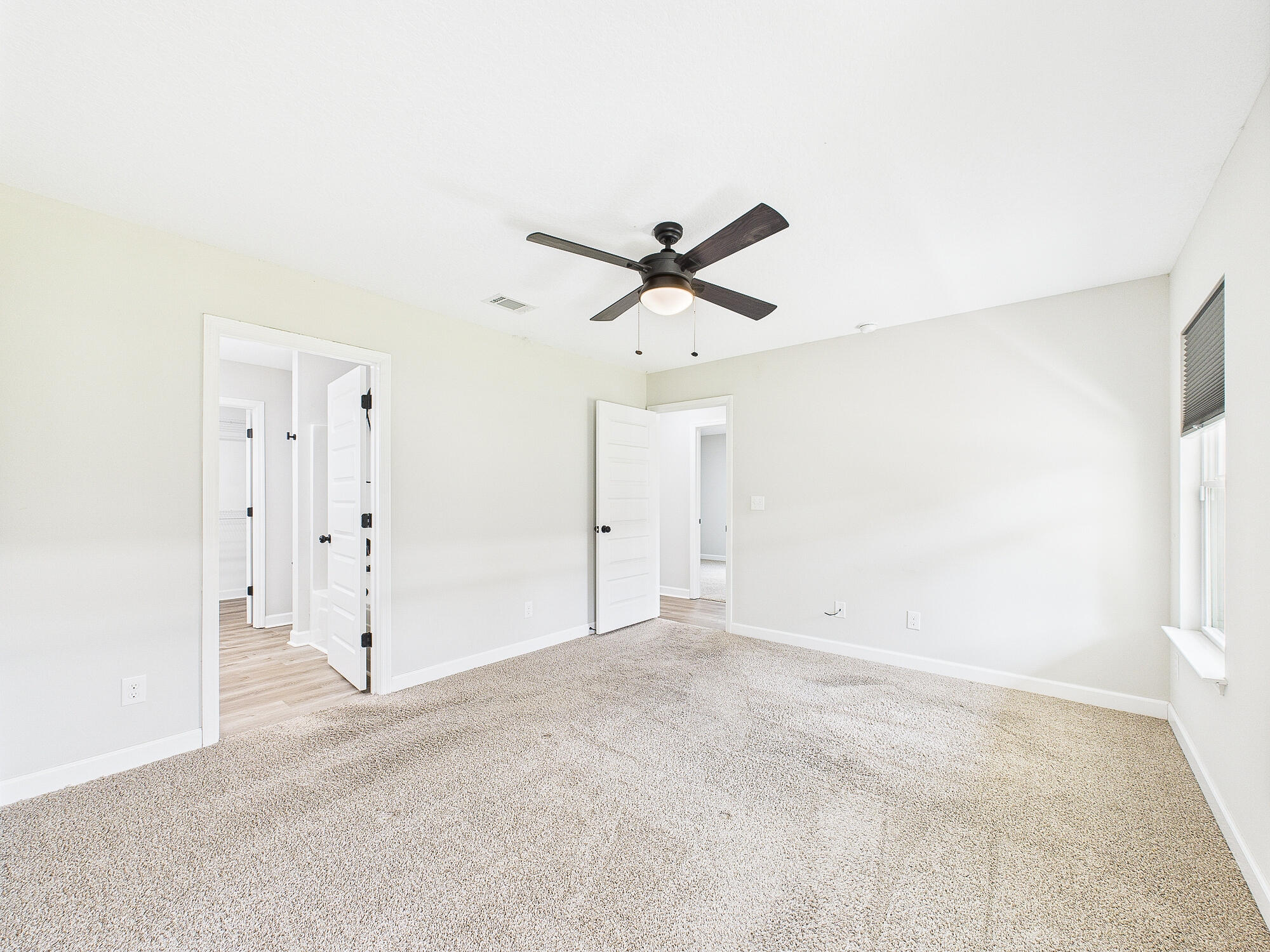 5117 Colt Drive Crestview, FL 32539 - Photo 15 of 32 a view of a livingroom with a ceiling fan and window