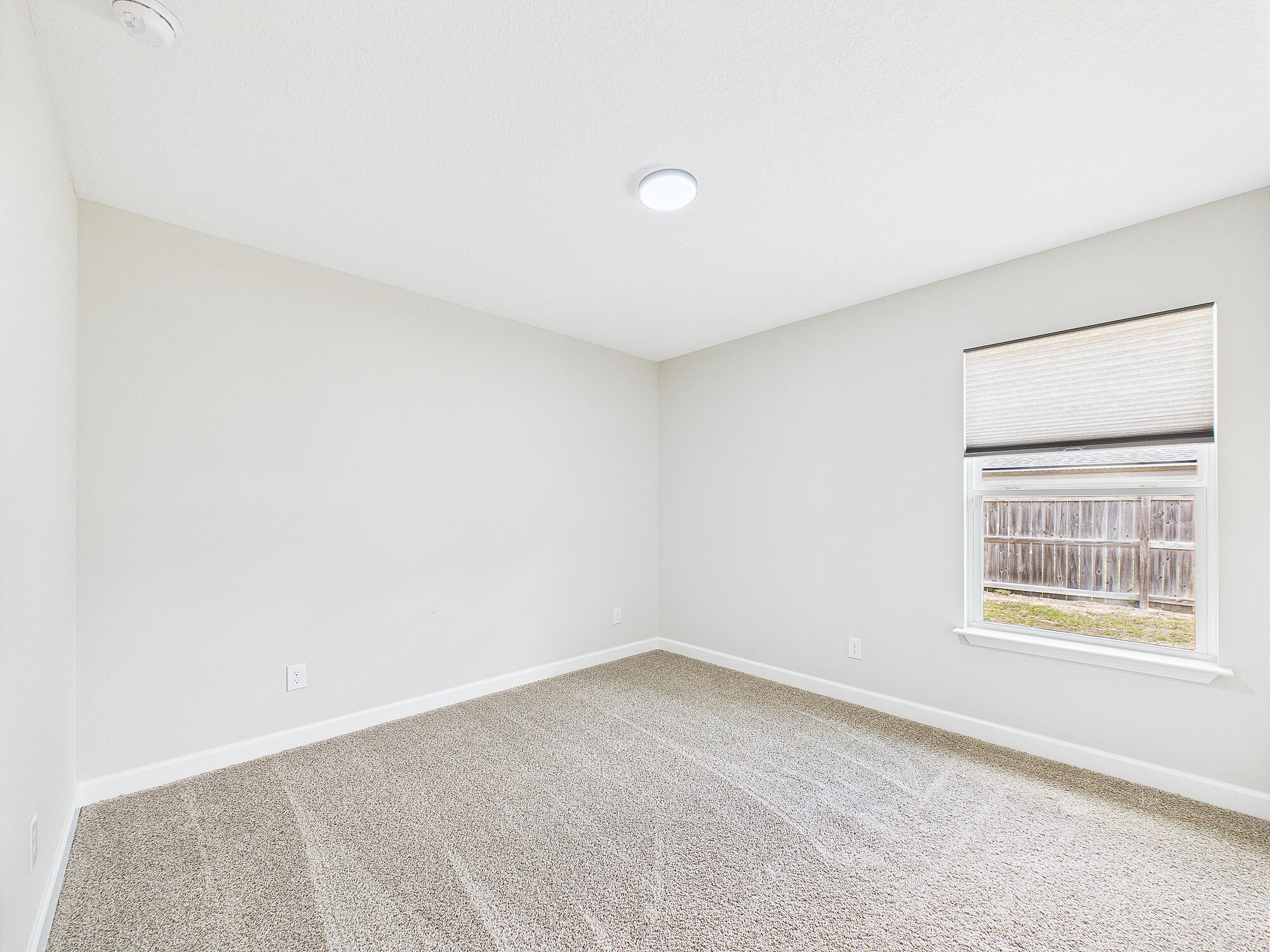 5117 Colt Drive Crestview, FL 32539 - Photo 19 of 32 an empty room with a window