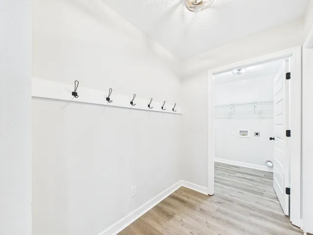 a view of small space with wooden floor