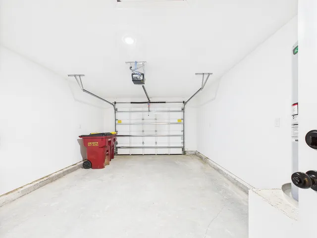 a view of empty room with racks on the wall