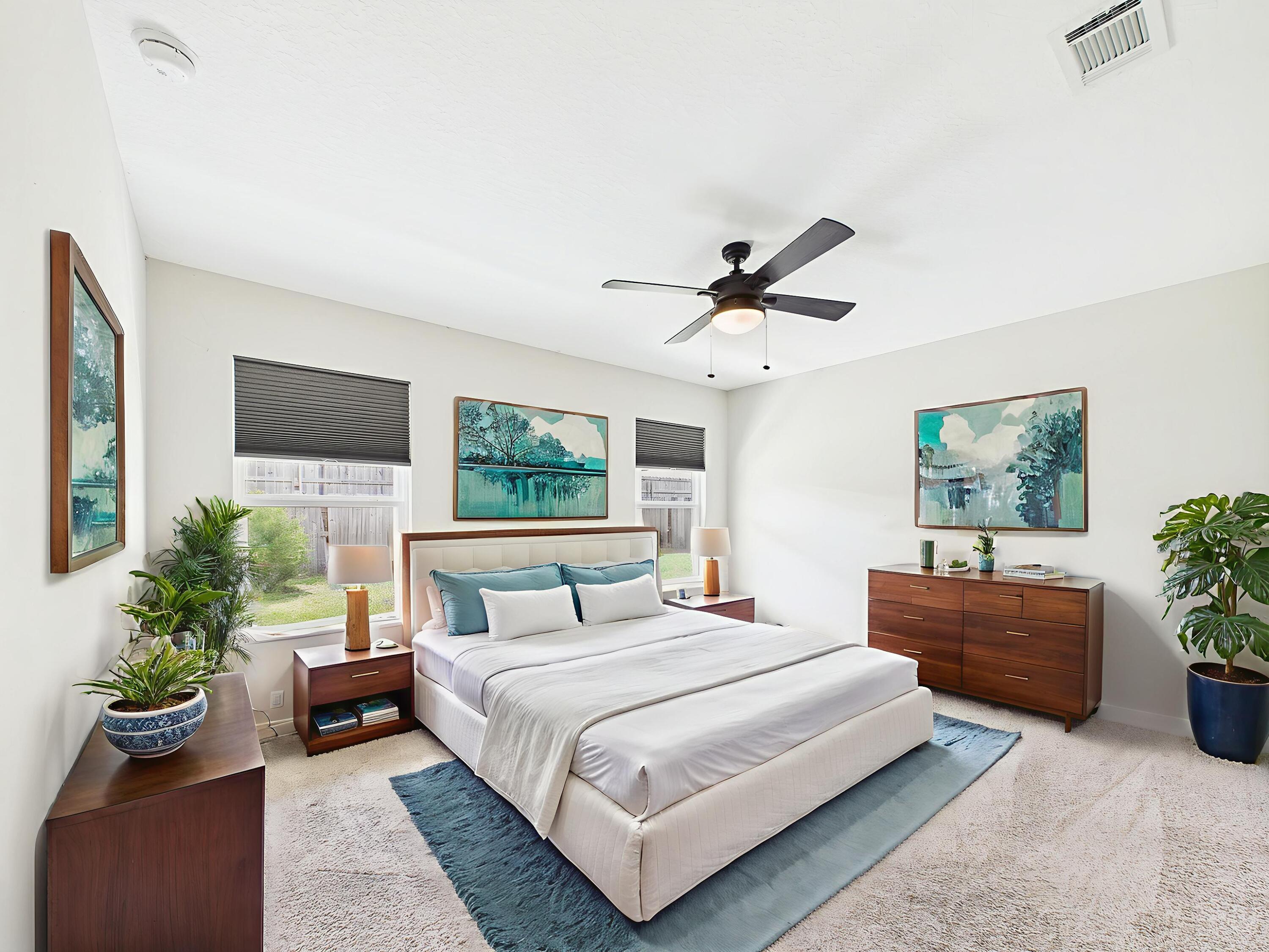 5117 Colt Drive Crestview, FL 32539 - Photo 4 of 32 a bedroom with a large bed and a couch