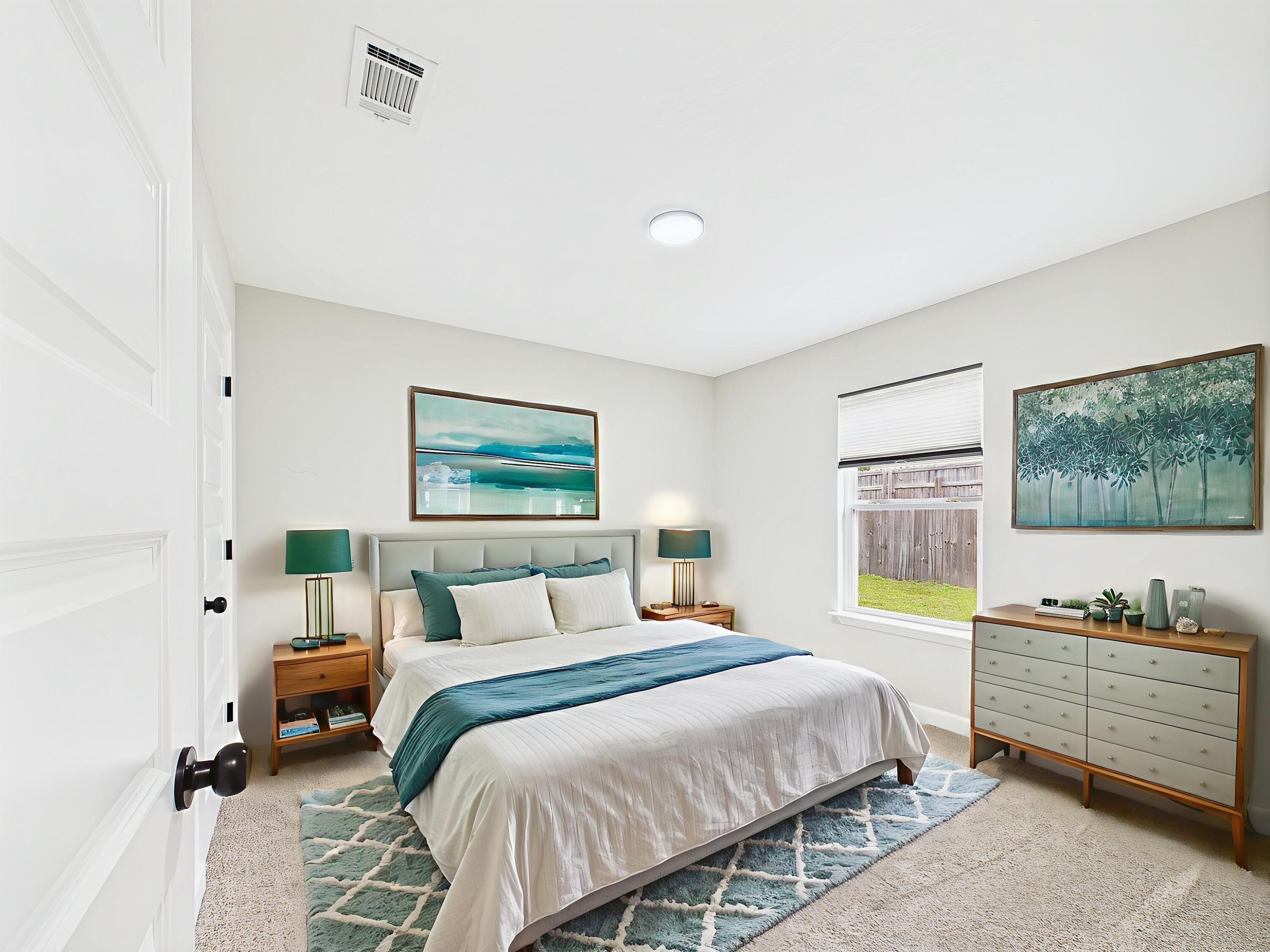 5117 Colt Drive Crestview, FL 32539 - Photo 5 of 32 a bedroom with a bed and window