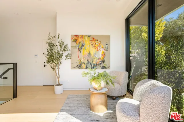a view of a dining room with furniture and breakfast area