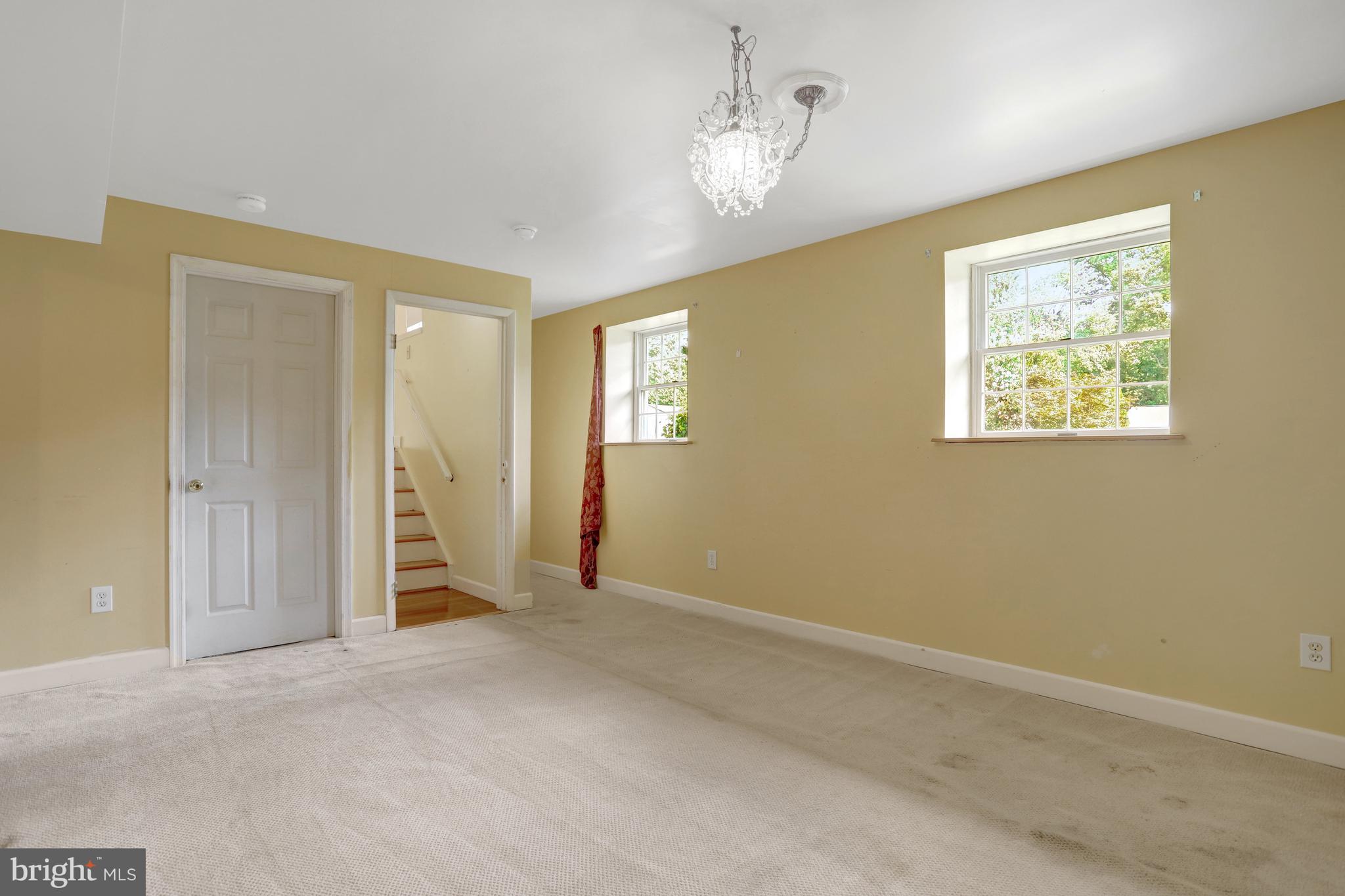 7615 Springfield Hills Drive Springfield, VA 22153 - Photo 39 of 71 a view of an empty room with a window