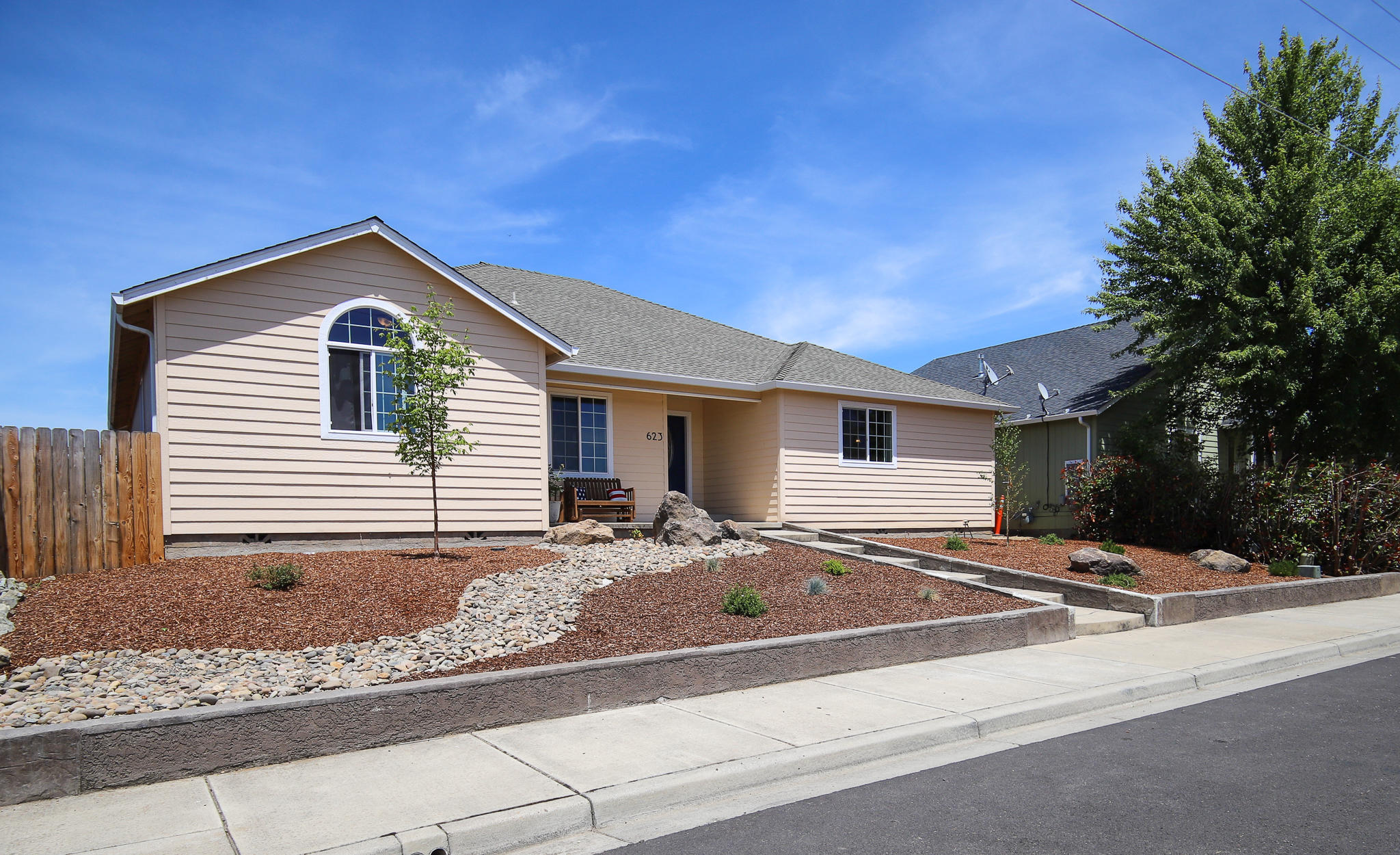 623 Barton Road Eagle Point, OR 97524 - Photo 1 of 28 a view of a house with a yard and large tree