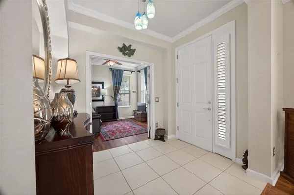 a bedroom with a bed and a mirror