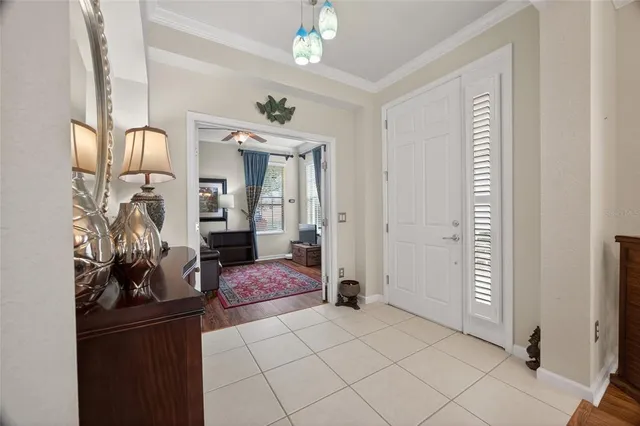 a bedroom with a bed and a mirror