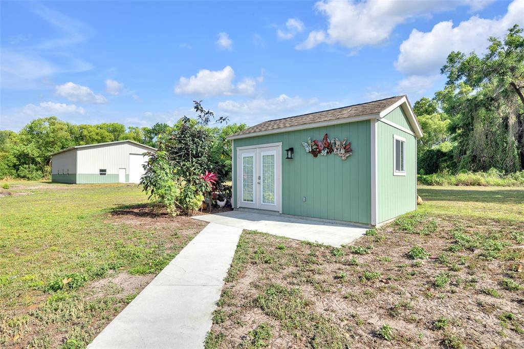 3535 Moores Lake Road Dover, FL 33527 - Photo 56 of 85 Detached office with concrete sidewalk and patio.