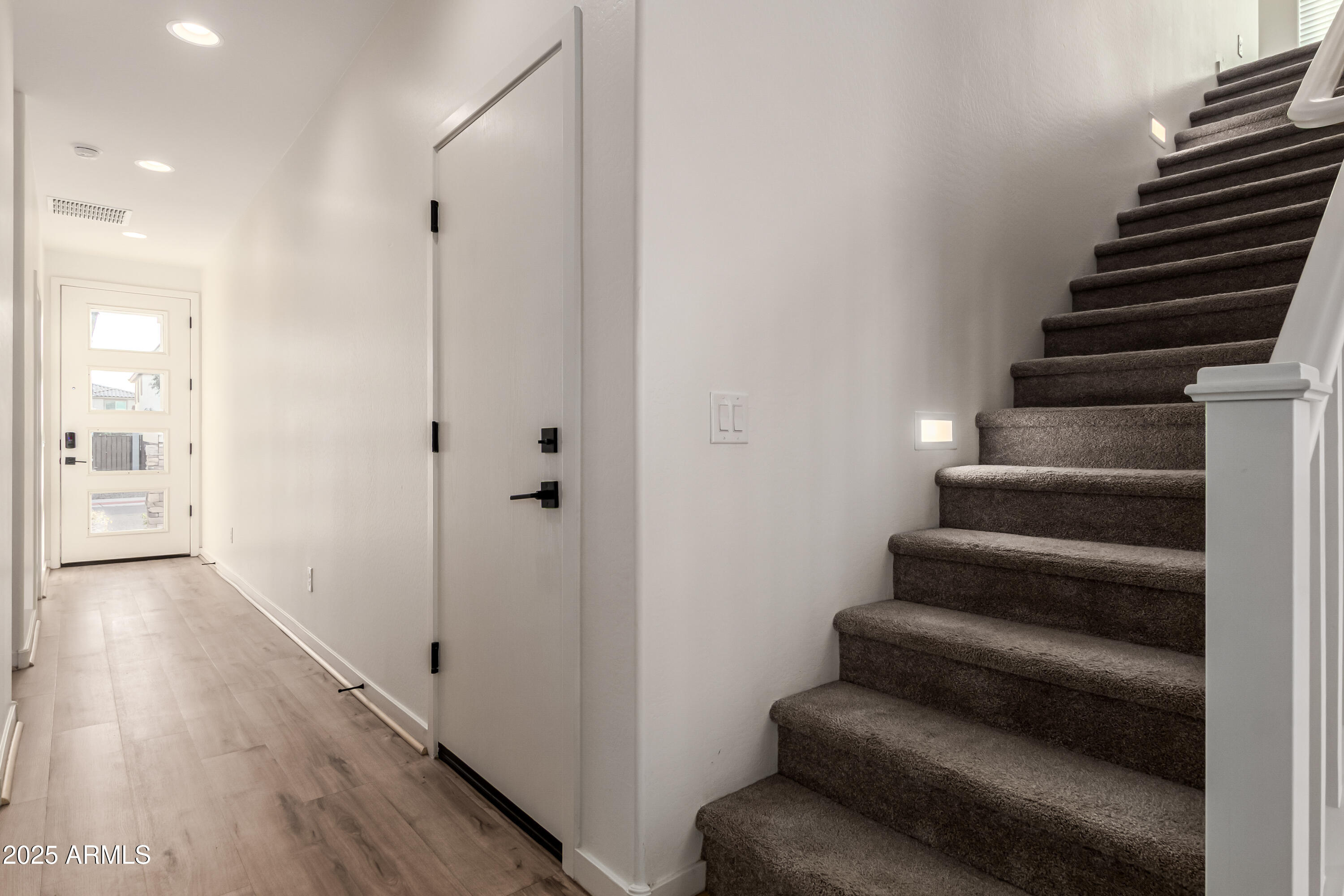 20 East Main Street Mesa, AZ 85201 - Photo 11 of 46 a view of entryway and hall with wooden floor
