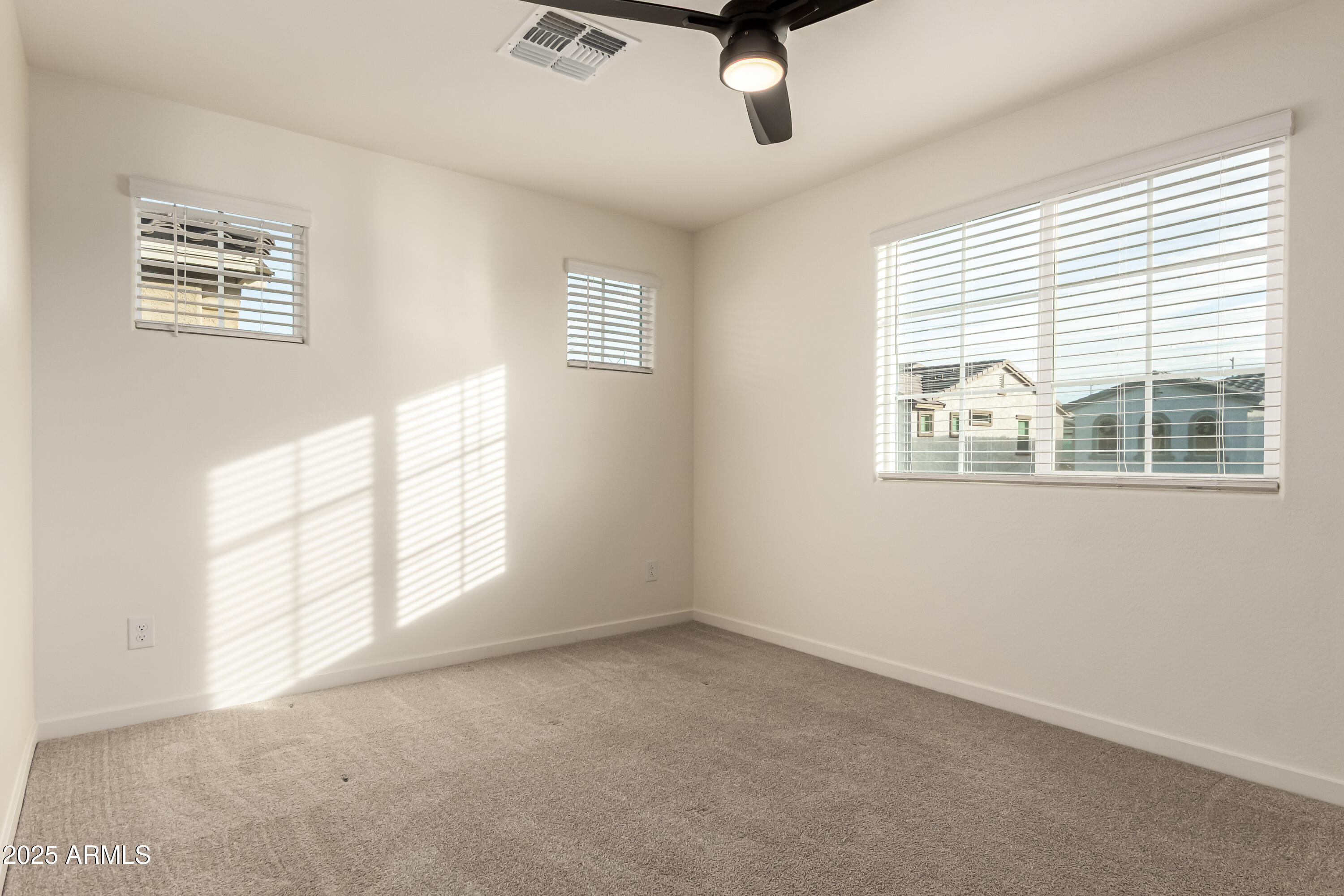 20 East Main Street Mesa, AZ 85201 - Photo 32 of 46 an empty room with windows