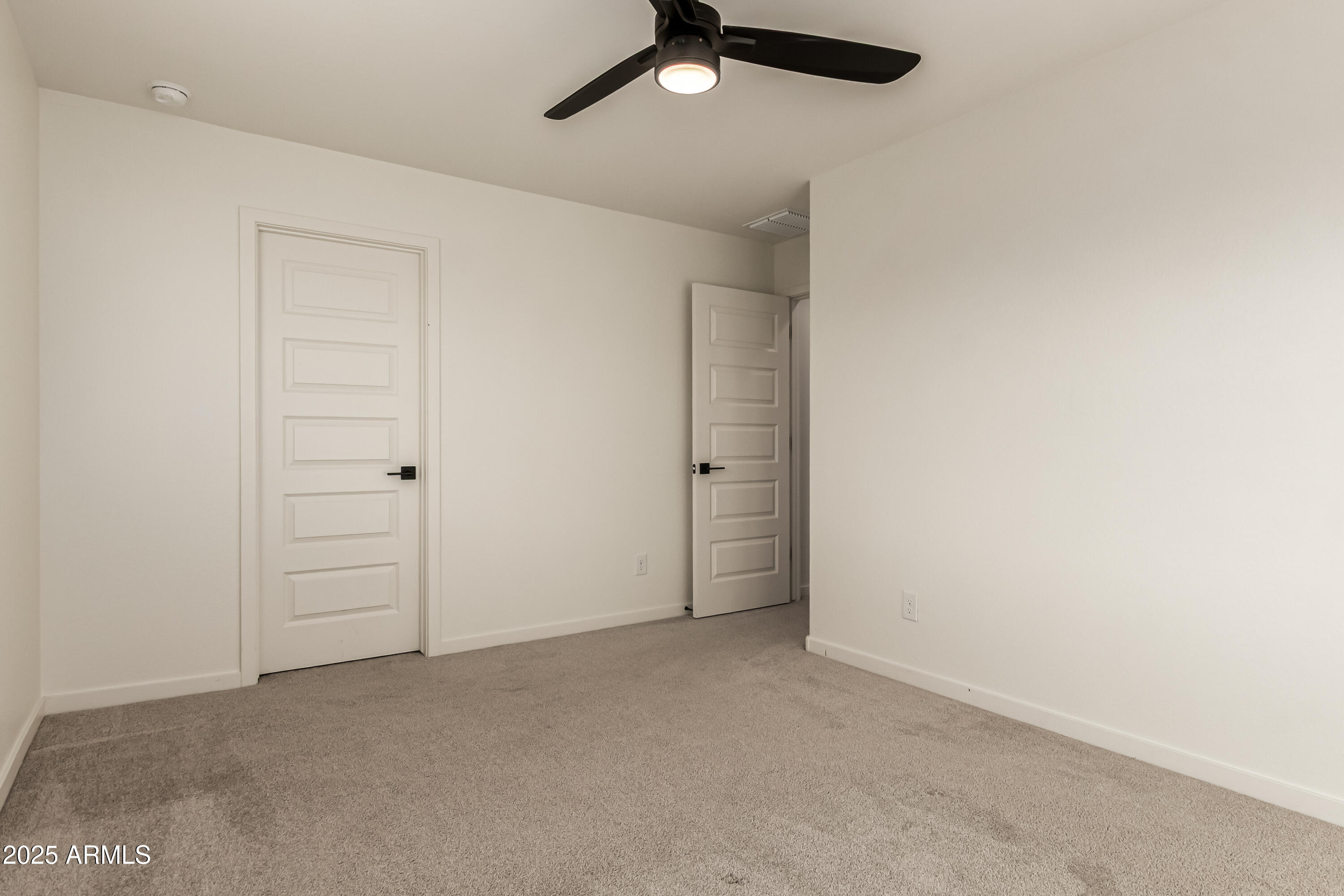 20 East Main Street Mesa, AZ 85201 - Photo 33 of 46 an empty room with closet area