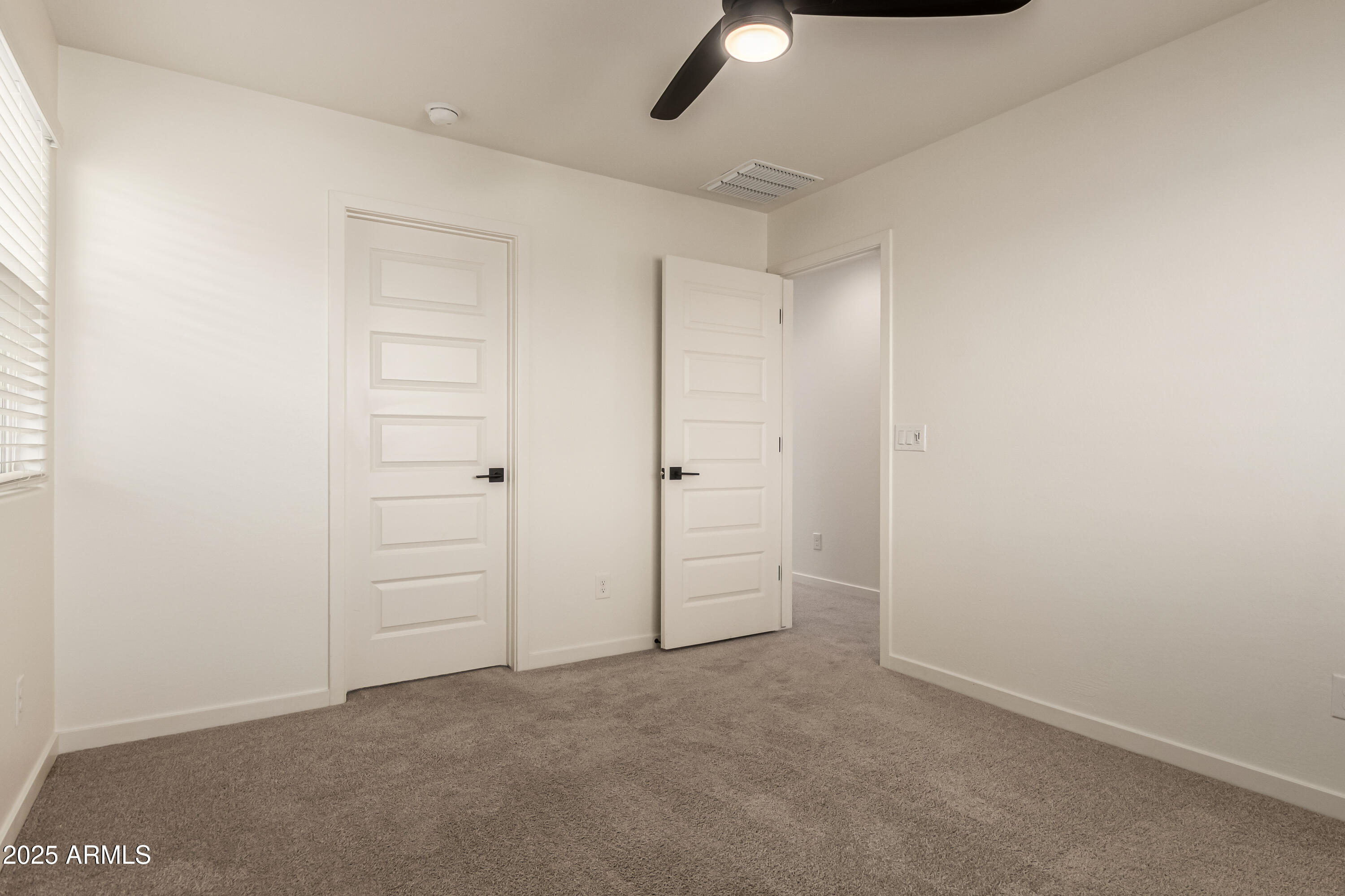 20 East Main Street Mesa, AZ 85201 - Photo 35 of 46 an empty room with closet area