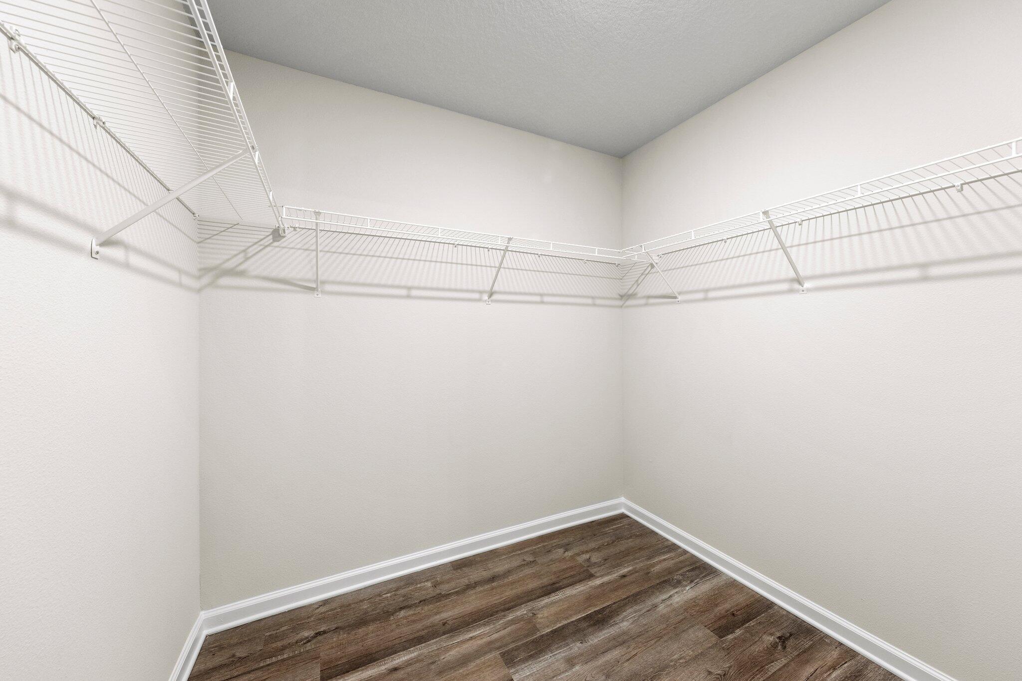 733 Quintana Street Crestview, FL 32539 - Photo 16 of 25 a view of a room with racks on the wall