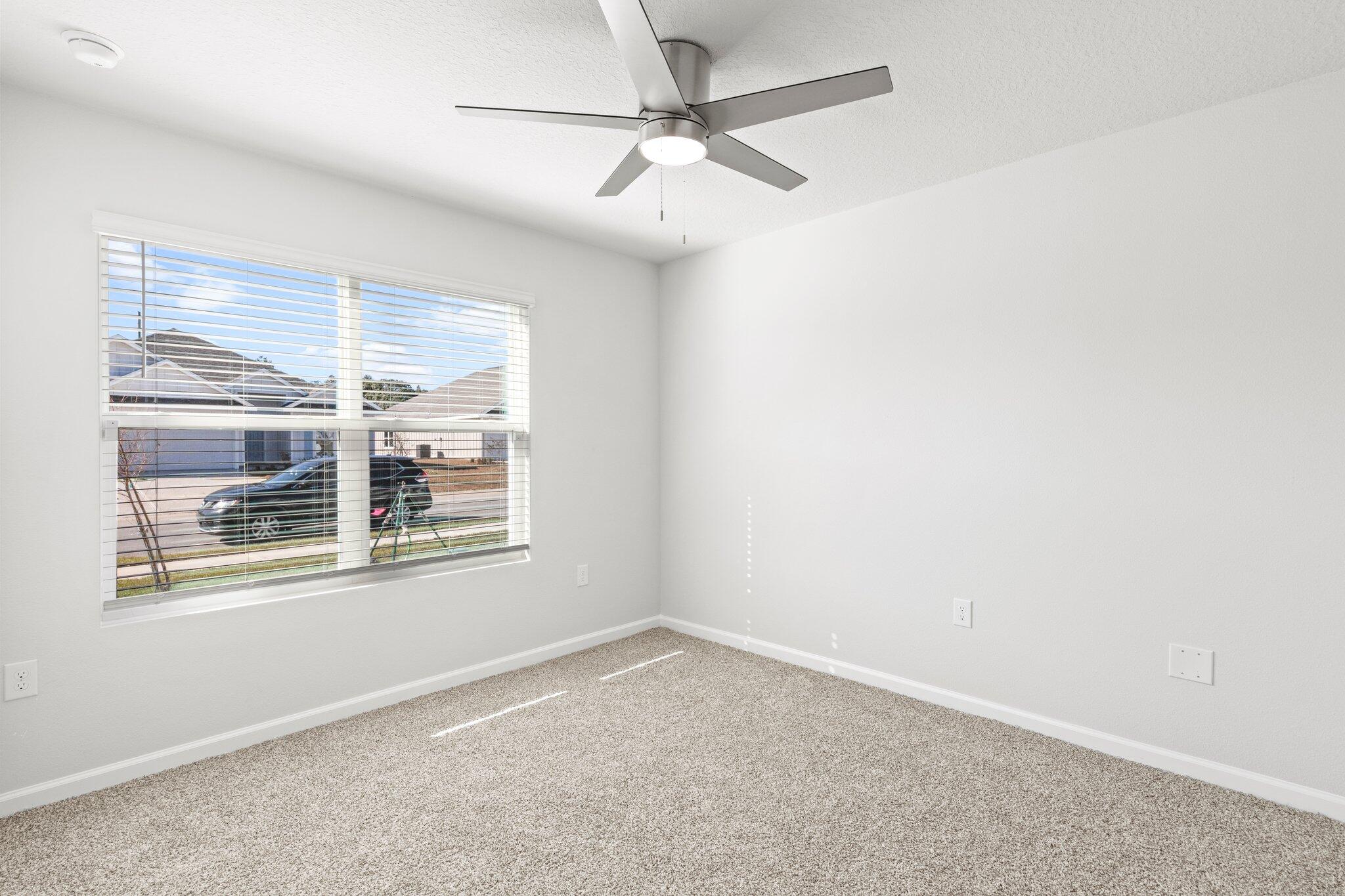 733 Quintana Street Crestview, FL 32539 - Photo 18 of 25 an empty room with a window