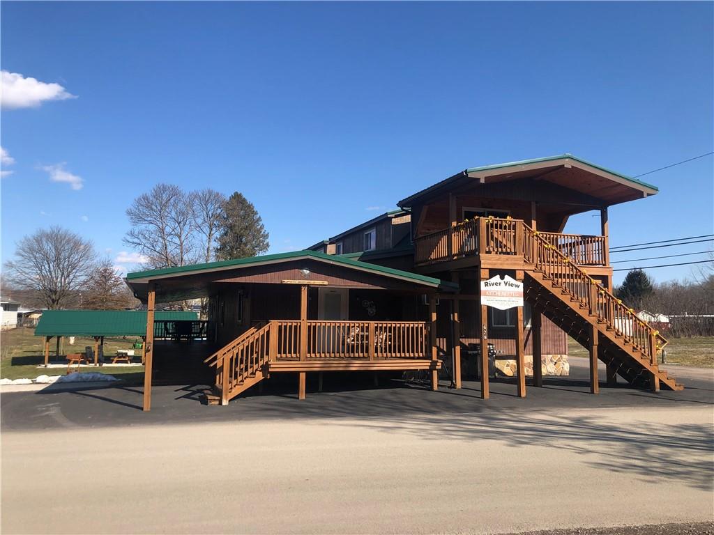 629 River Road Confluence, PA 15424 - Photo 1 of 50 a view of outdoor space with deck and barbeque oven