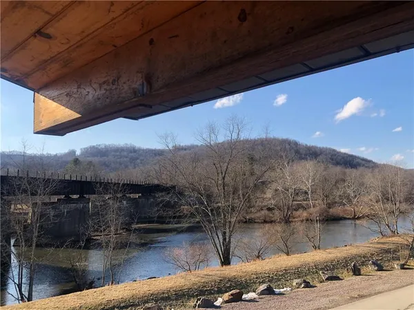 a view of a lake from a balcony