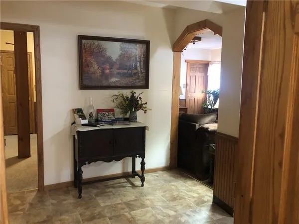 a room with furniture and a mirror