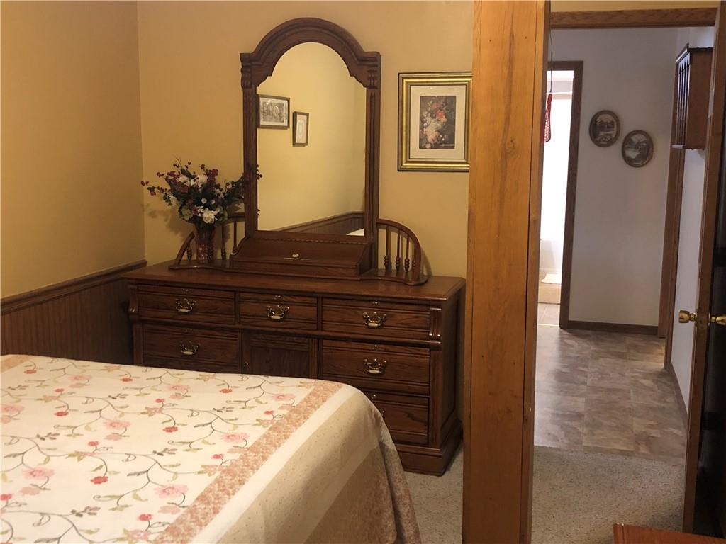 629 River Road Confluence, PA 15424 - Photo 23 of 50 a bed room with a bed and a dresser