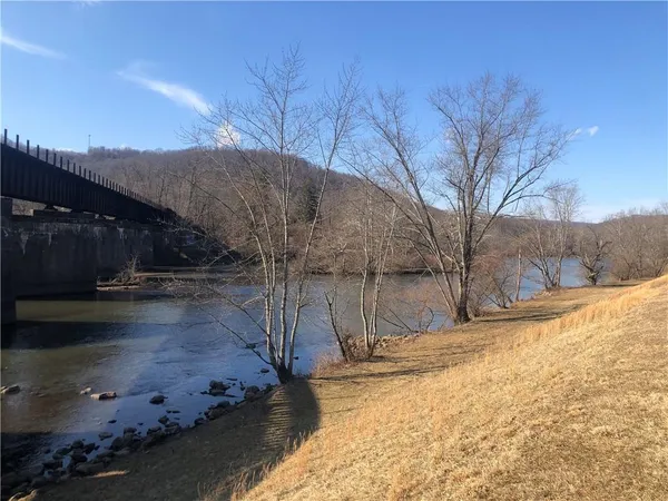 a view of a yard covered with snow in the yard