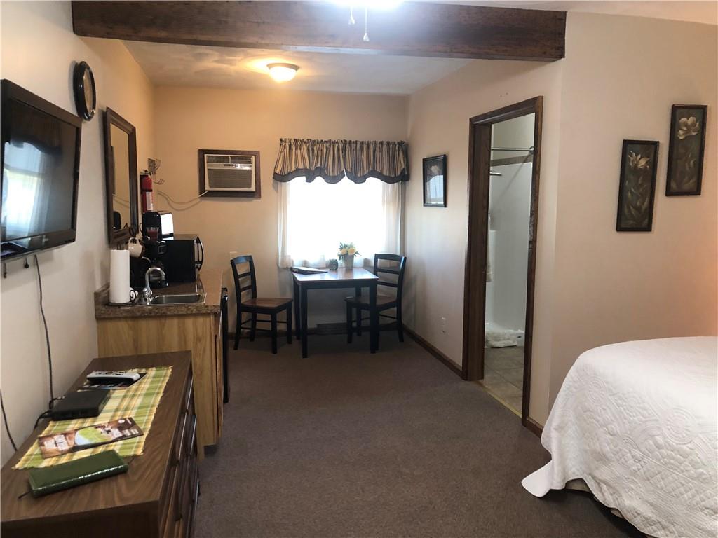 629 River Road Confluence, PA 15424 - Photo 45 of 50 a room with furniture and a flat screen tv