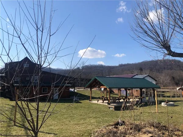 a view of a swimming pool with an outdoor seating