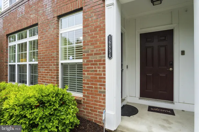 a view of a door and a window
