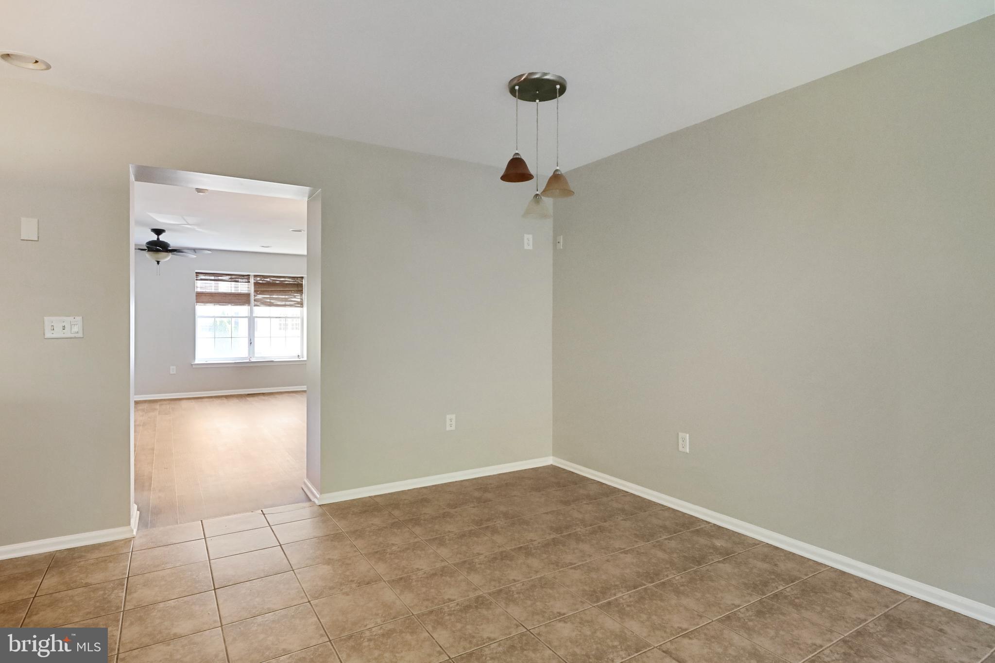 1041 Buckingham Thorofare, NJ 08086 - Photo 12 of 35 a view of an empty room with closet and windows