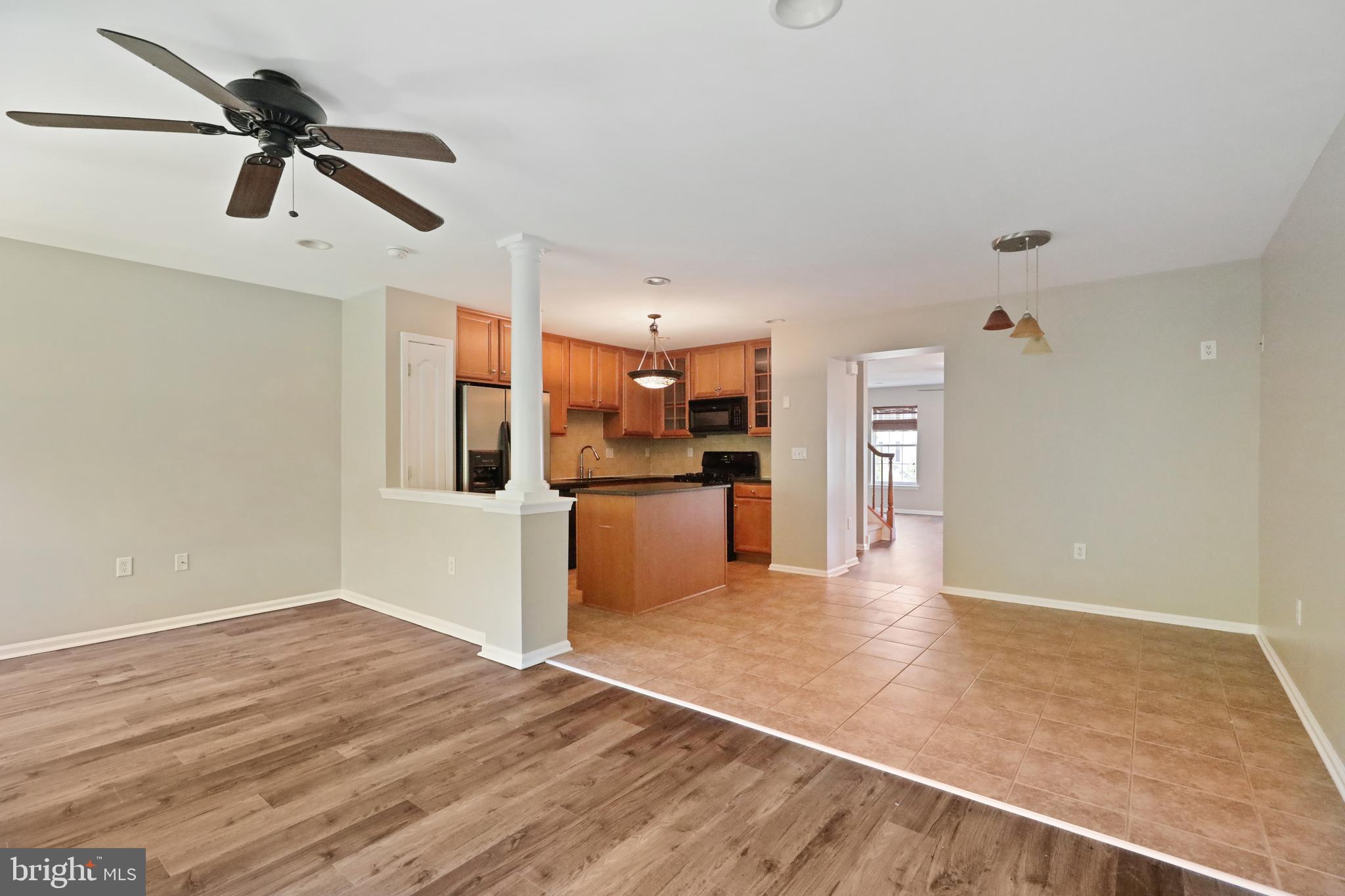 1041 Buckingham Thorofare, NJ 08086 - Photo 15 of 35 a view of a kitchen with a sink and refrigerator