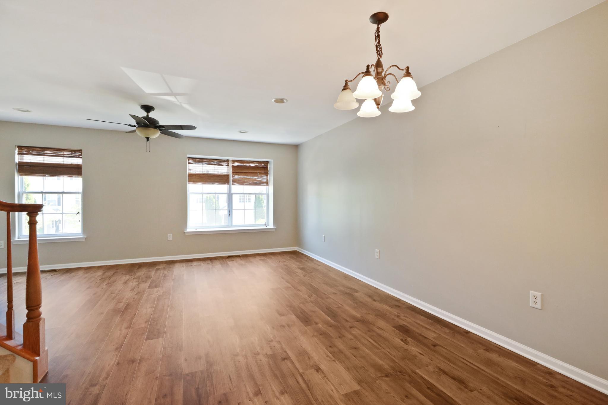 1041 Buckingham Thorofare, NJ 08086 - Photo 18 of 35 wooden floor in an empty room with a window