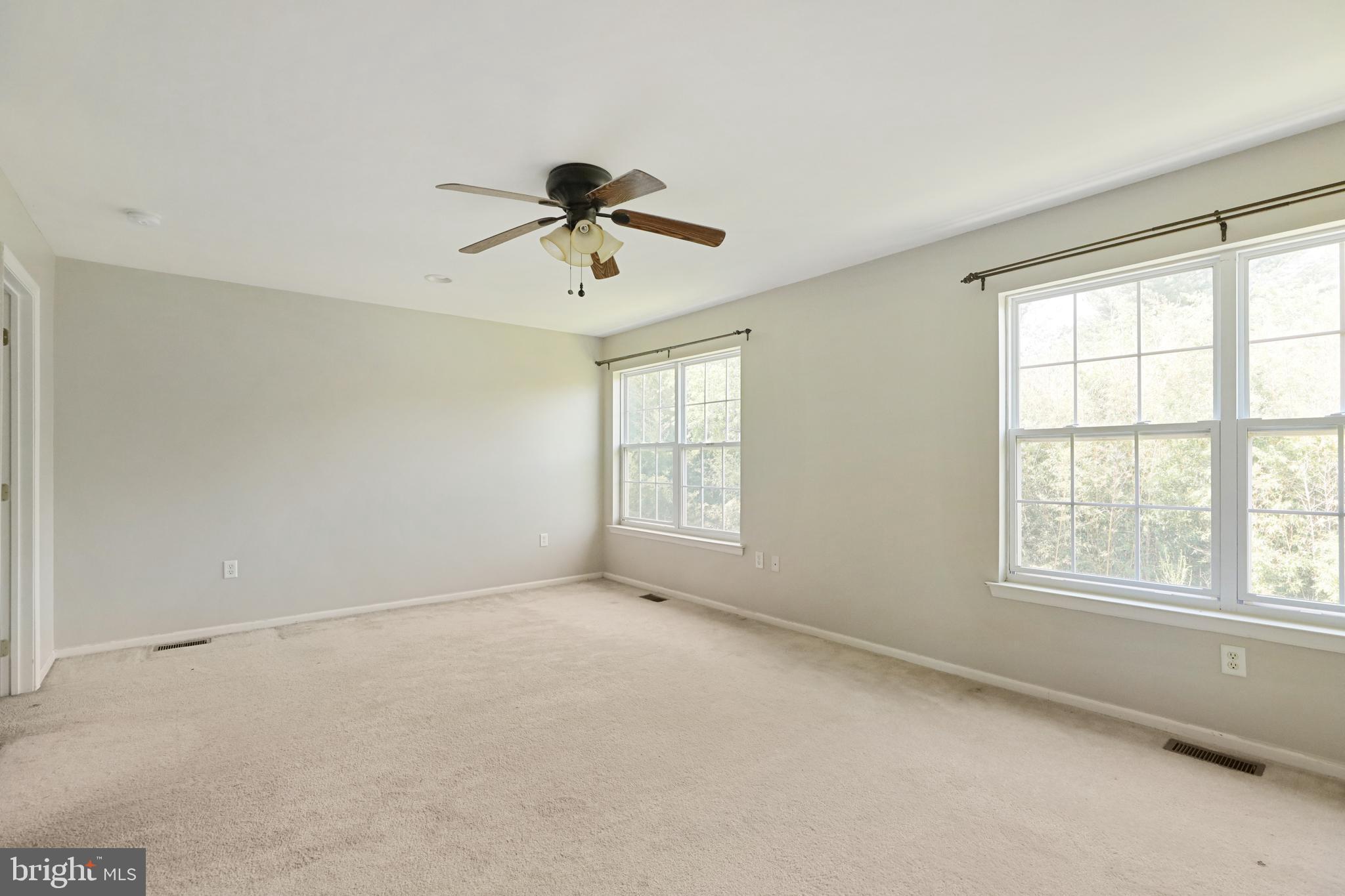 1041 Buckingham Thorofare, NJ 08086 - Photo 23 of 35 a view of room with a ceiling fan and window