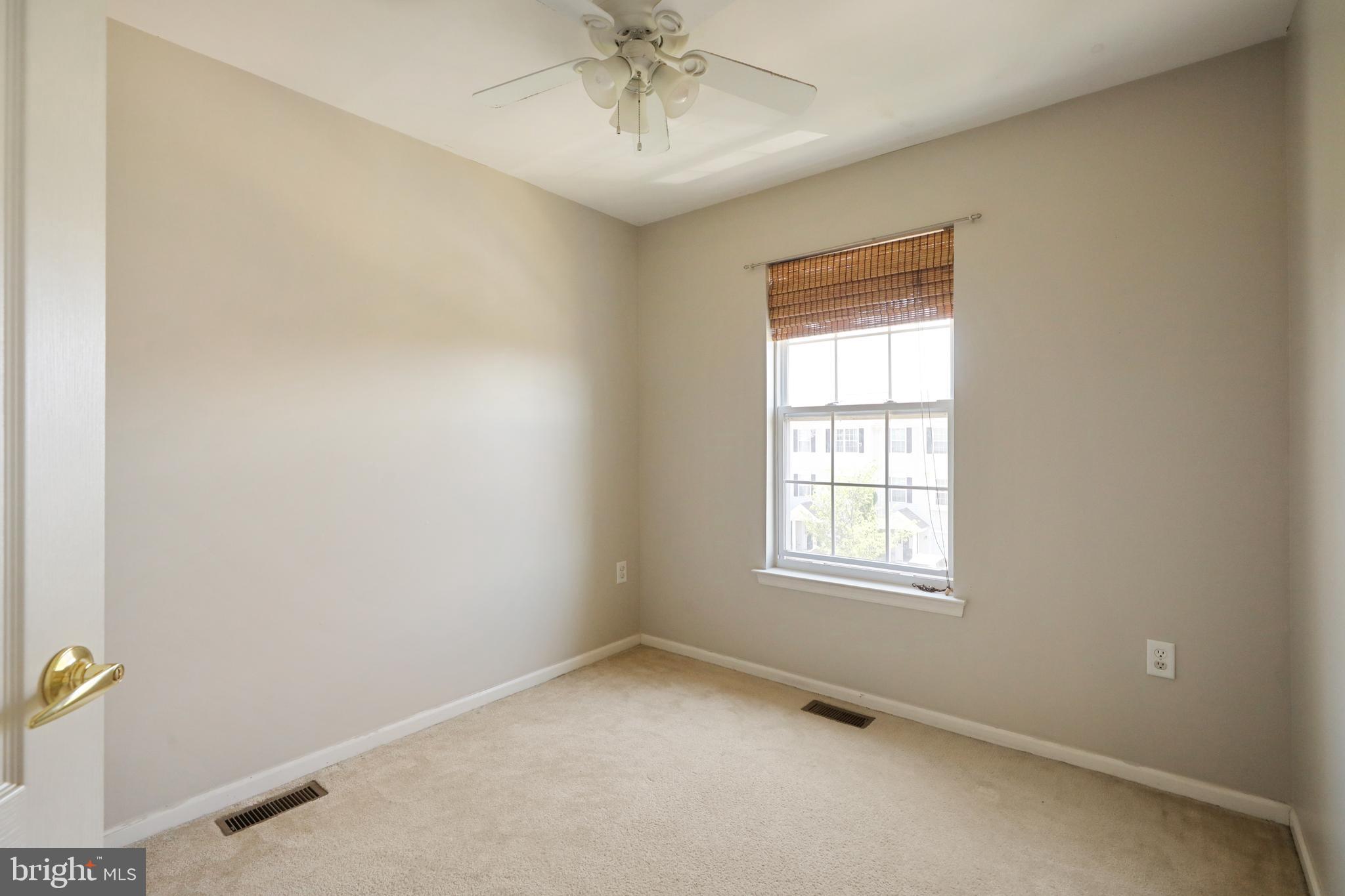 1041 Buckingham Thorofare, NJ 08086 - Photo 28 of 35 an empty room with a window