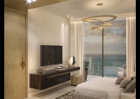 a room with a bed and a mirror