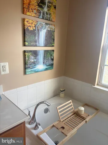 a view of livingroom with furniture and window