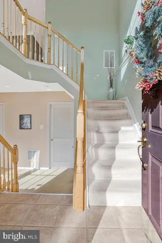 a view of entryway with a front door